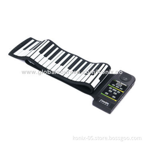 Roll up piano keyboard with sustain pedals